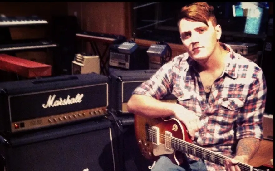 Dave Rutherford with his electric guitar