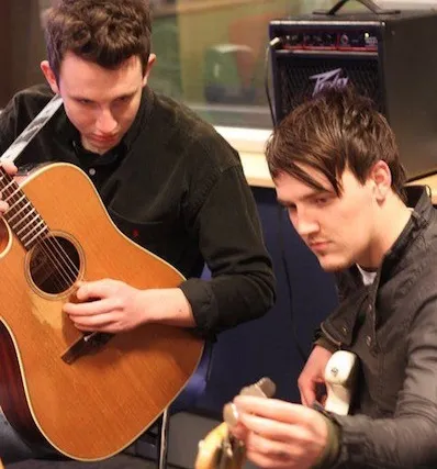 Dave Rutherford during a guitar lesson
