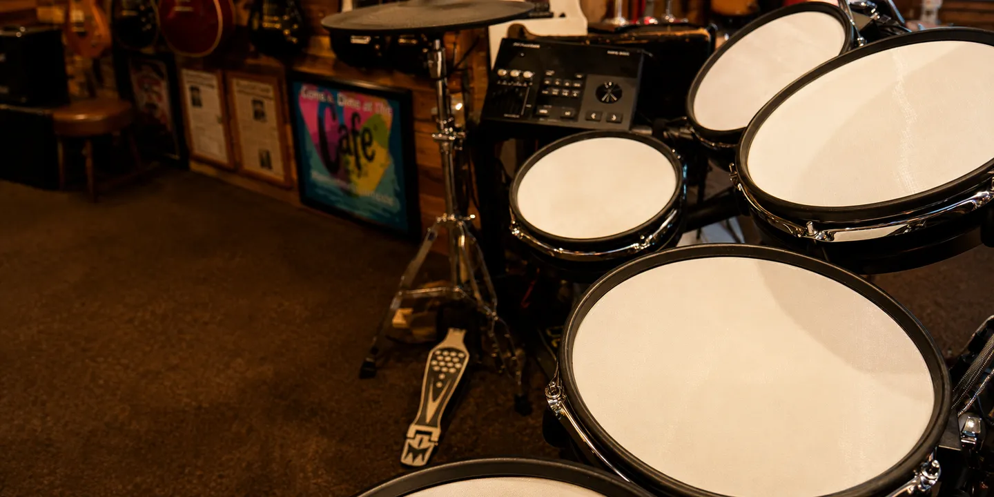 Drum pads and equipment set up for lessons at Six String Studio